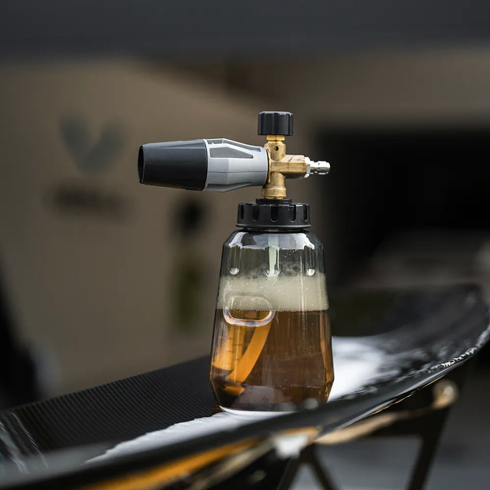 Foam cannon for car washing on a blurred background