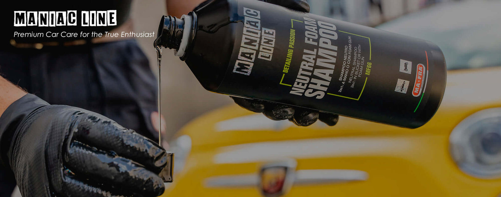Maniac Line foam shampoo for car detailing displayed with yellow Fiat